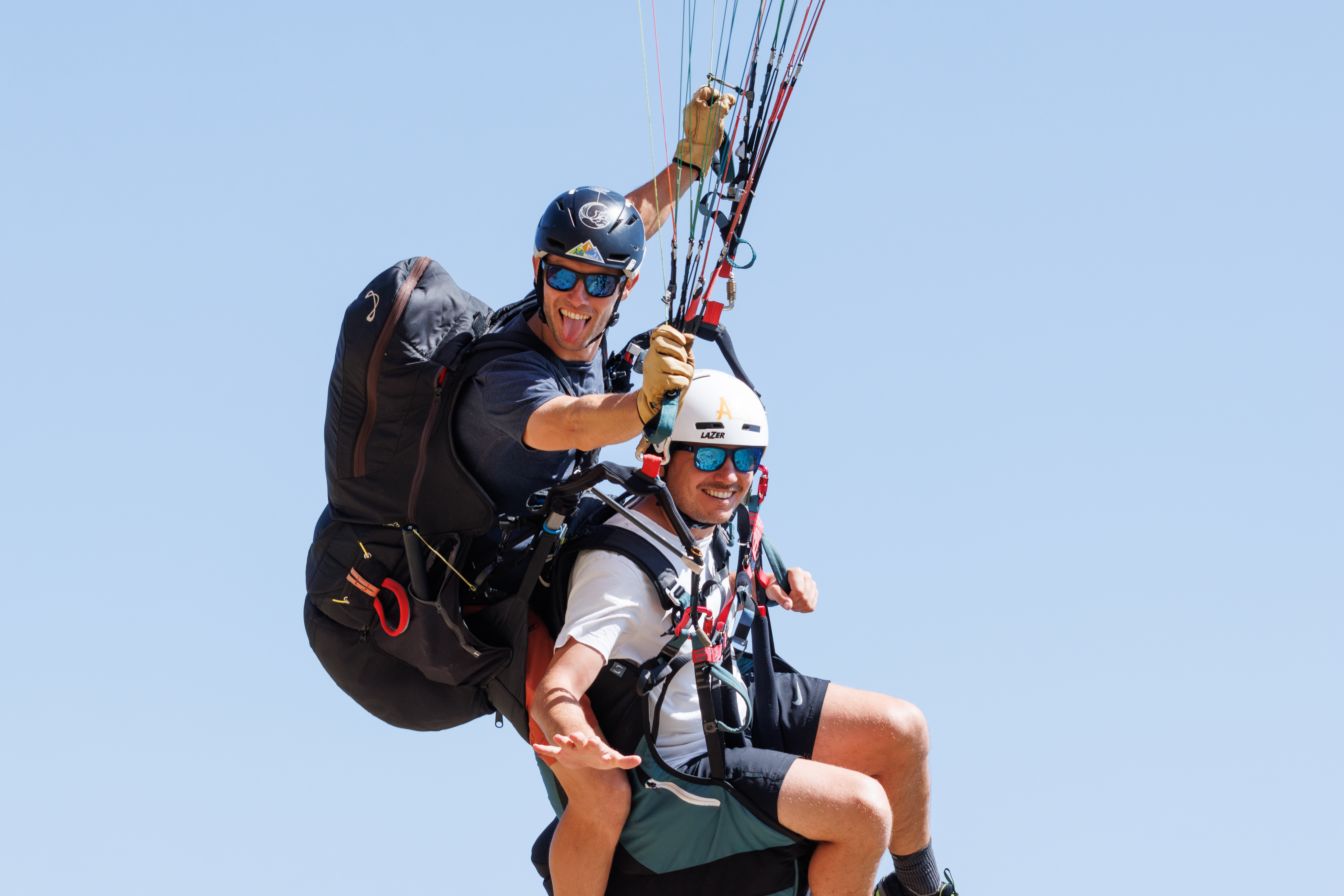 Educational tandem flight, instructor and passenger at the controls over the French Riviera
