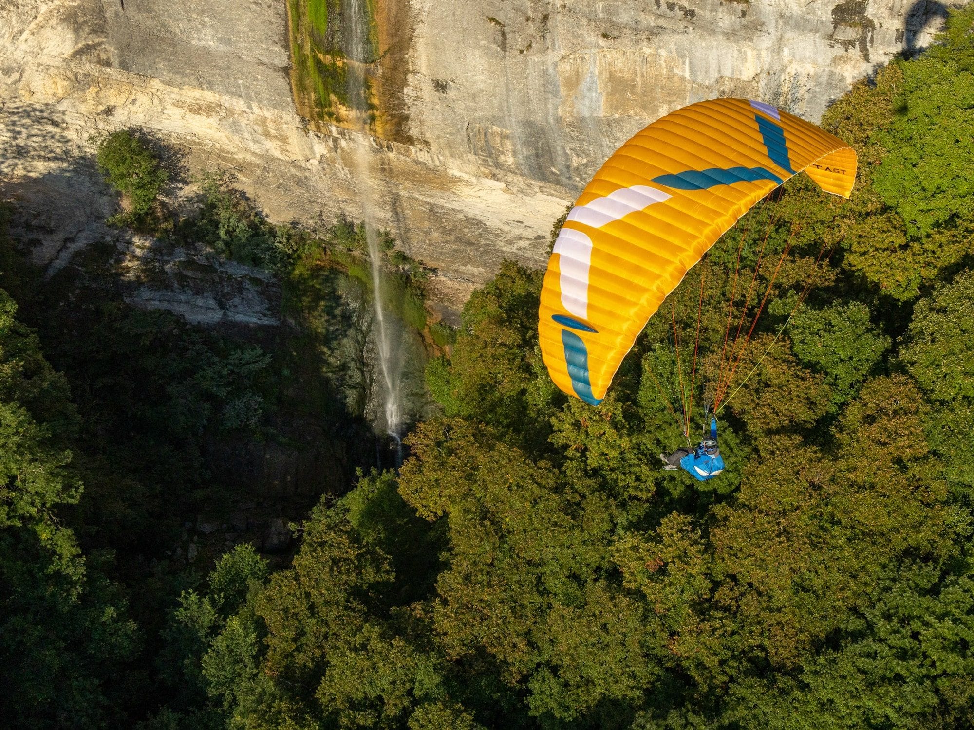 The Ozone Alta GT wing on the ground, light construction for hike and fly