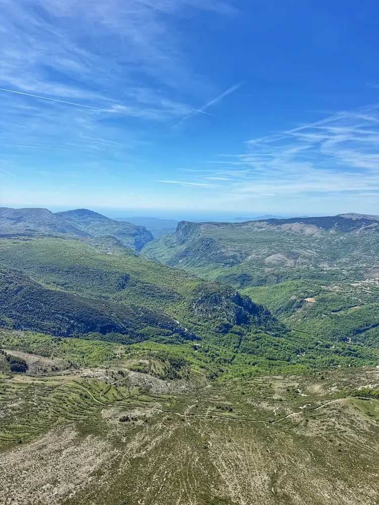 Panorama of the reliefs of the Alpes-Maritimes with the Mediterranean Sea in the horizon, airfield Ailéments